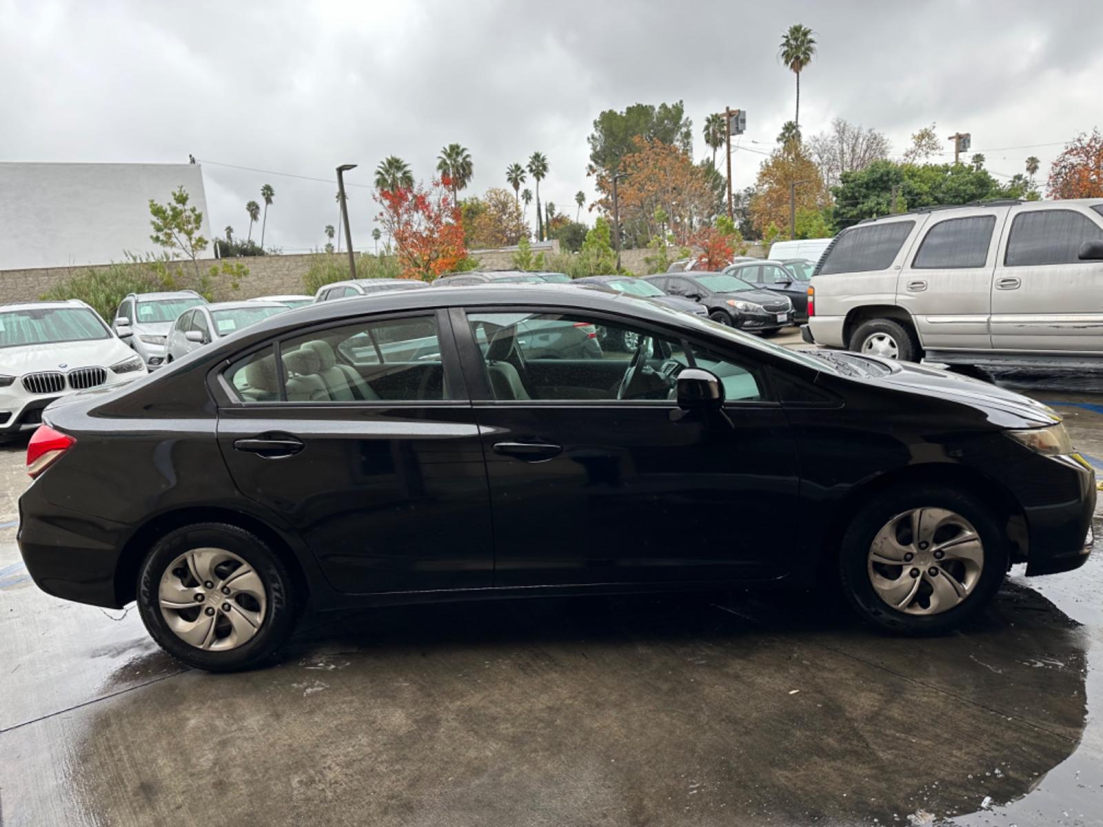2013 Black /Grey Honda Civic LX Sedan 5-Speed AT (19XFB2F53DE) with an 1.8L L4 SOHC 16V engine, 5-Speed Automatic transmission, located at 30 S. Berkeley Avenue, Pasadena, CA, 91107, (626) 248-7567, 34.145447, -118.109398 - New Paint! Gas Saver! Discover Reliable and Efficient Driving: 2013 Honda Civic LX Now at Our Pasadena, CA Dealership Step into the world of efficiency and reliability with the 2013 Honda Civic LX, a standout choice now featured at our BHPH dealership in Pasadena, CA. Known for its dependable per - Photo #3